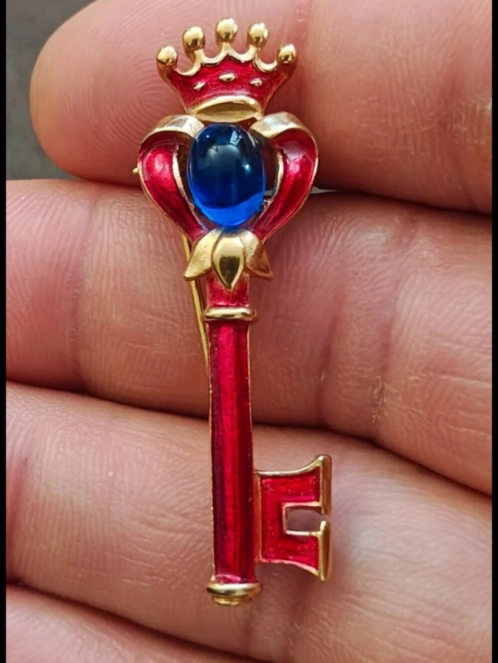 1940s/50s Crown Trifari Gold Tone Key Brooch With Red Enamel and Blue Cabochon